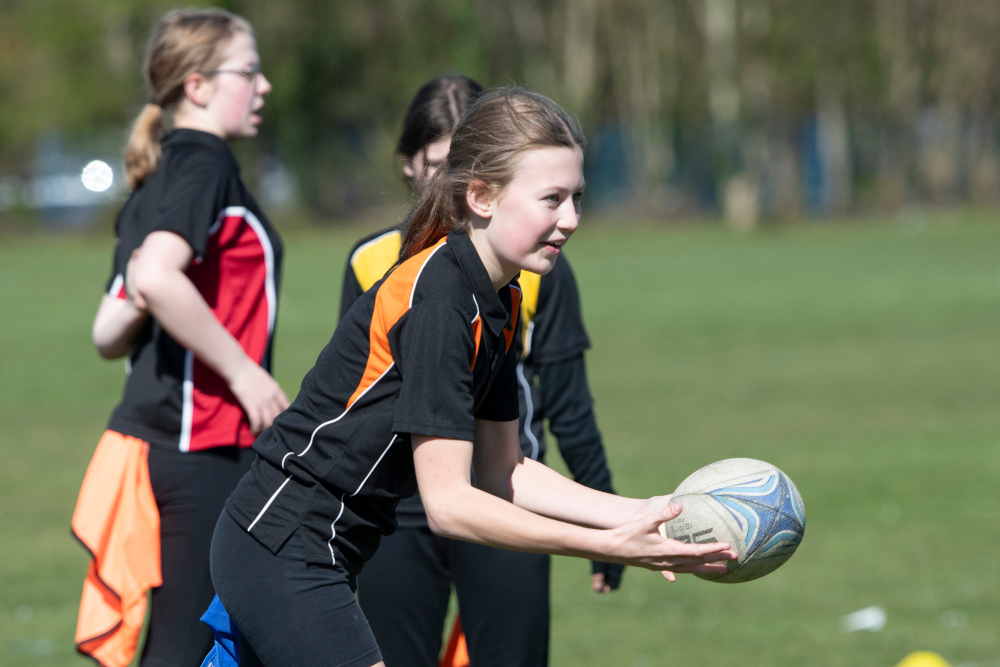 Student Playing Rugby Student Playing Rugby