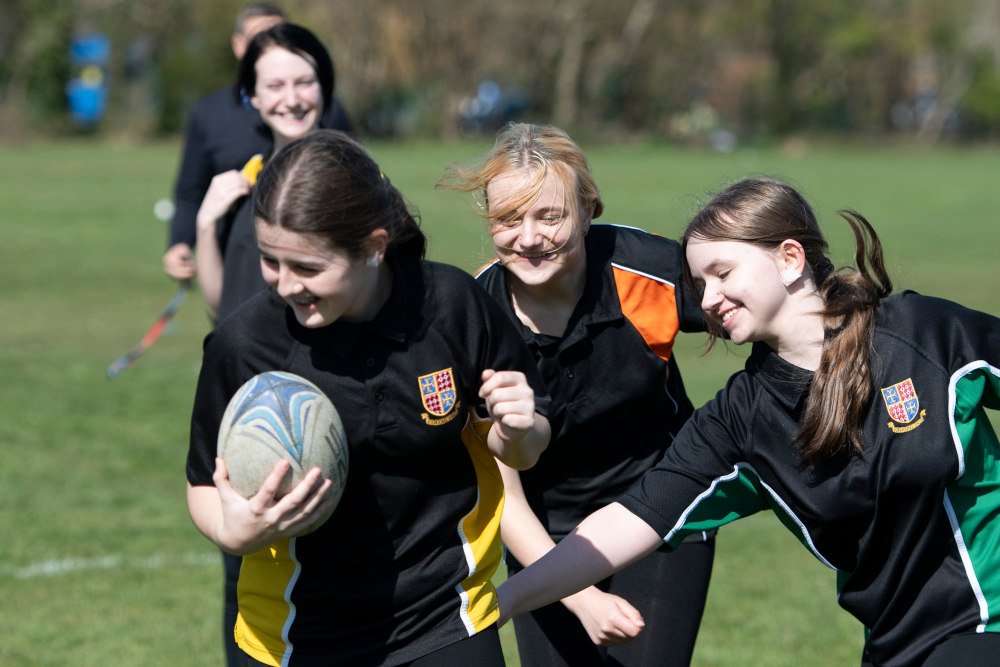 Students Playing Rugby Students Playing Rugby