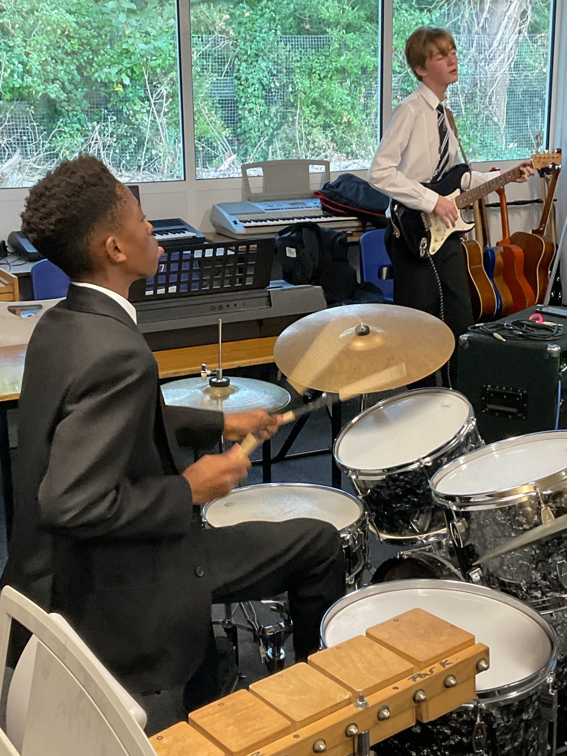 Pupil Playing Some Drums