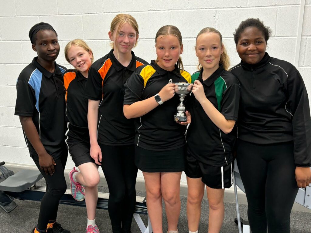 Pupils Holding Sports Cup Pupils Holding Sports Cup