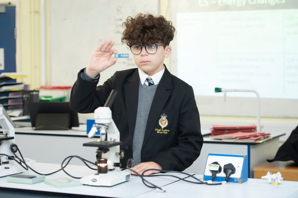 Student with Microscope Slide