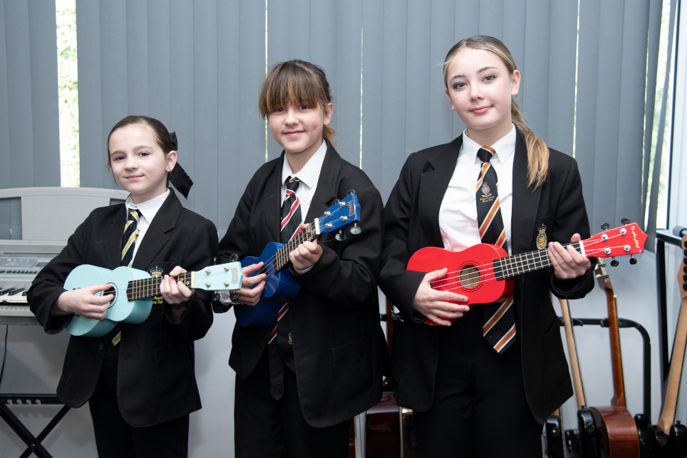 Students Playing Ukulele Students Playing Ukulele